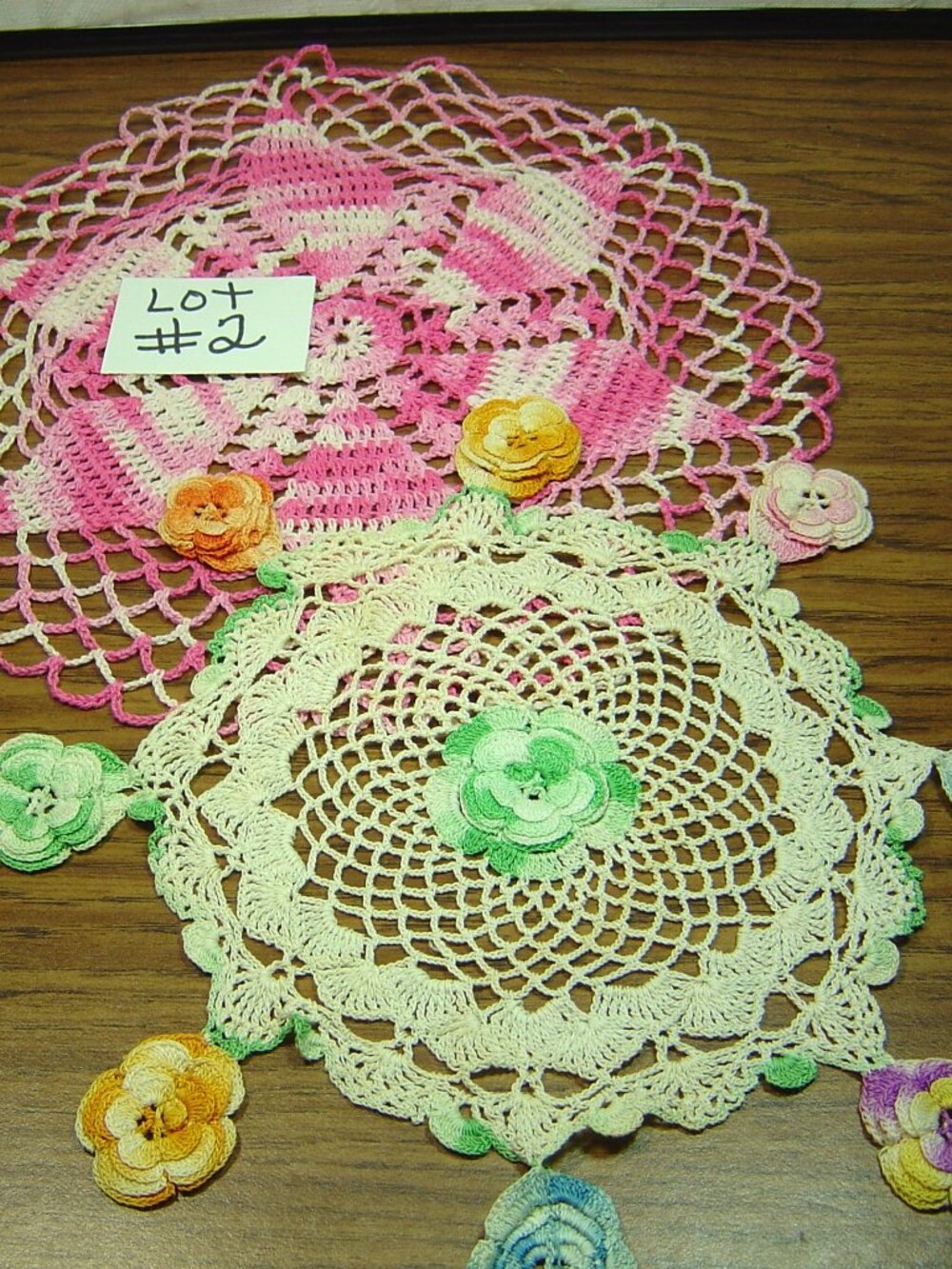 2 vintage colored crocheted doilies